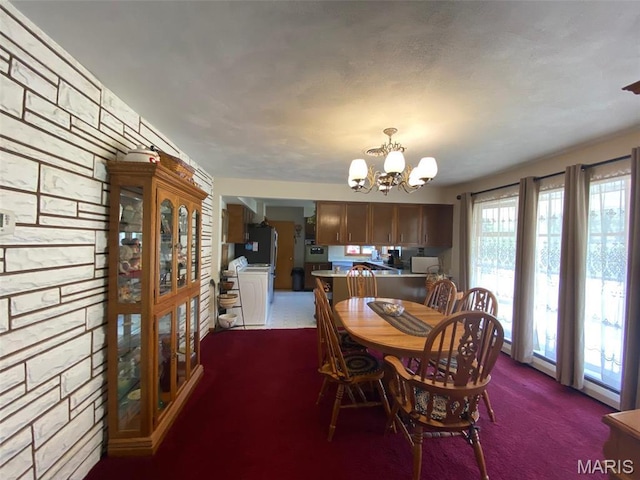 123 S Oak St, Nokomis, IL 62075 - carpeted dining space featuring a chandelier