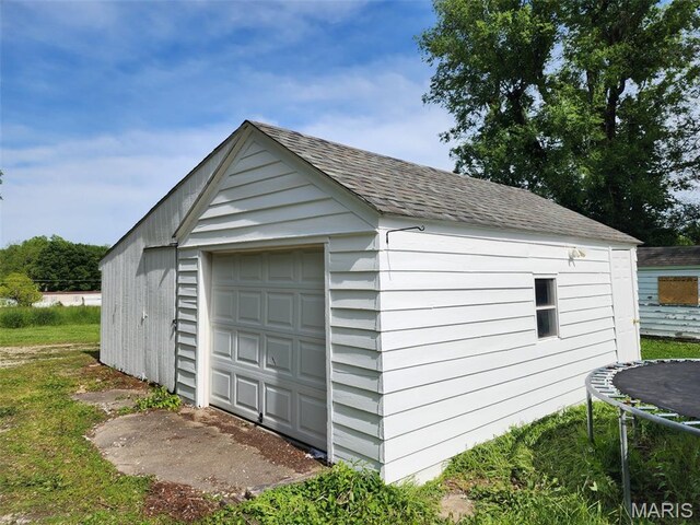 340 Kemper St, Troy, MO 63379 - detached garage with a trampoline