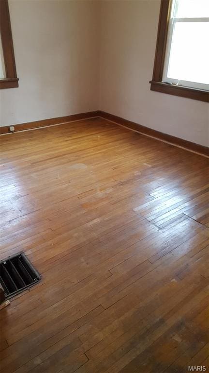 340 Kemper St, Troy, MO 63379 - empty room with hardwood / wood-style flooring and baseboards