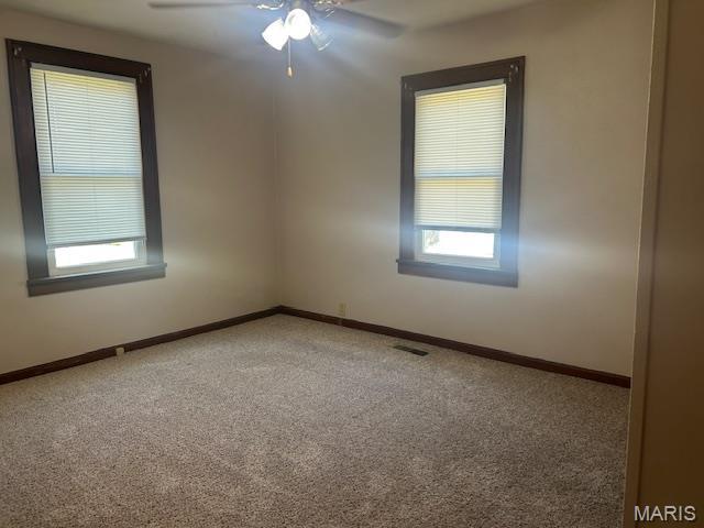 340 Kemper St, Troy, MO 63379 - carpeted empty room with a ceiling fan and baseboards