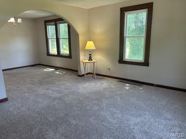 340 Kemper St, Troy, MO 63379 - unfurnished room featuring arched walkways and carpet