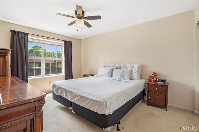 627 Rosetta Dr Unit M1, Florissant, MO 63031 - bedroom with light colored carpet, baseboards, and a ceiling fan
