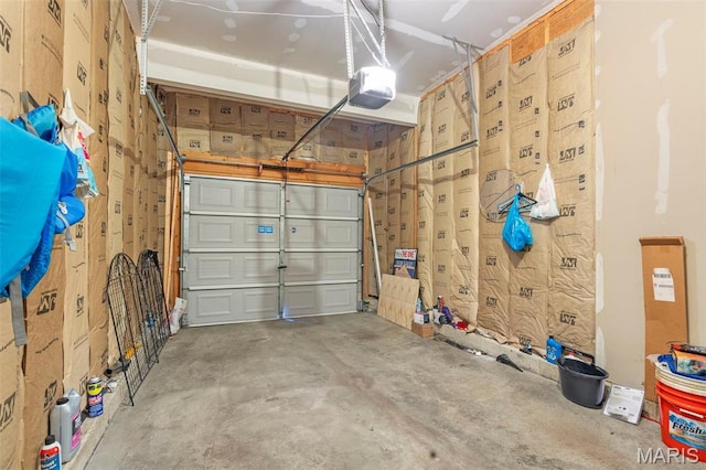 627 Rosetta Dr Unit M1, Florissant, MO 63031 - garage featuring a garage door opener