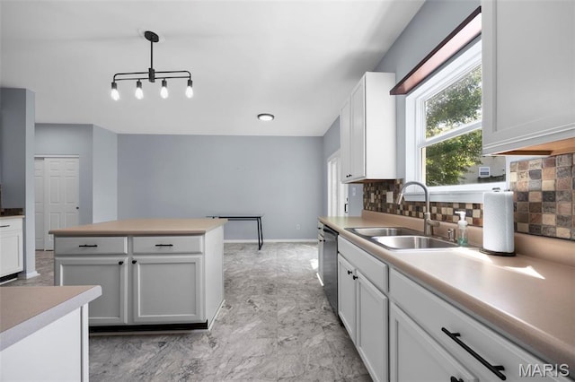 416 Briarchase Pl, Lake St Louis, MO 63367 - kitchen featuring a sink, dishwasher, backsplash, white cabinetry, and light countertops