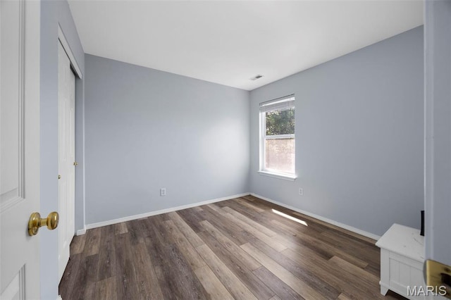 416 Briarchase Pl, Lake St Louis, MO 63367 - unfurnished bedroom with wood finished floors, baseboards, and a closet