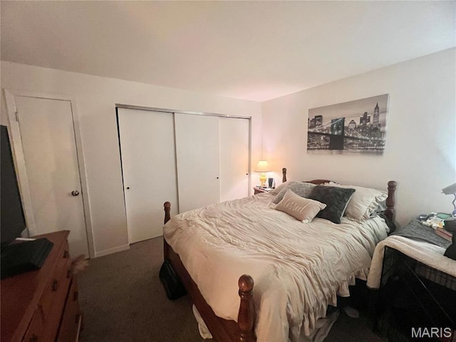 carpeted bedroom with a closet