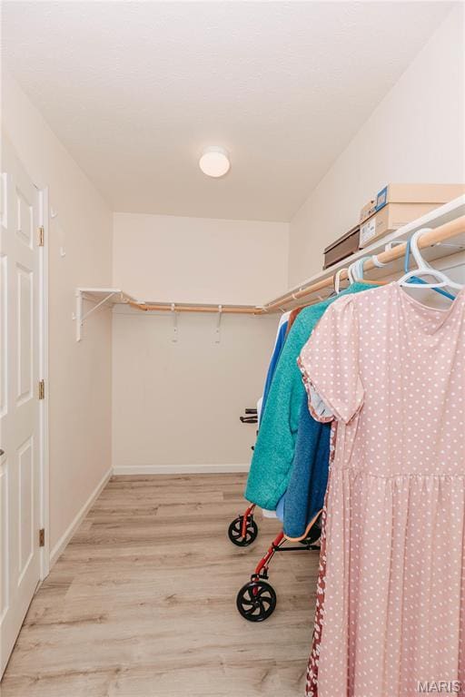 140 Vernon St, Saint Robert, MO 65584 - spacious closet featuring wood finished floors