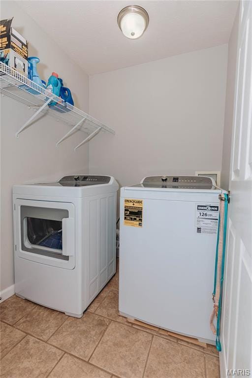 140 Vernon St, Saint Robert, MO 65584 - clothes washing area featuring washer and dryer
