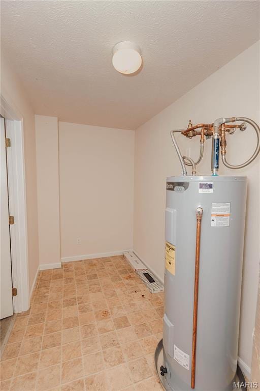 140 Vernon St, Saint Robert, MO 65584 - utility room featuring water heater