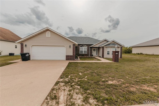 140 Vernon St, Saint Robert, MO 65584 - single story home with an attached garage, concrete driveway, a front lawn, brick siding, and cooling unit