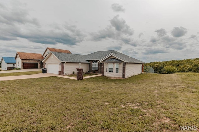 140 Vernon St, Saint Robert, MO 65584 - ranch-style home featuring driveway, a garage, a front lawn, and brick siding