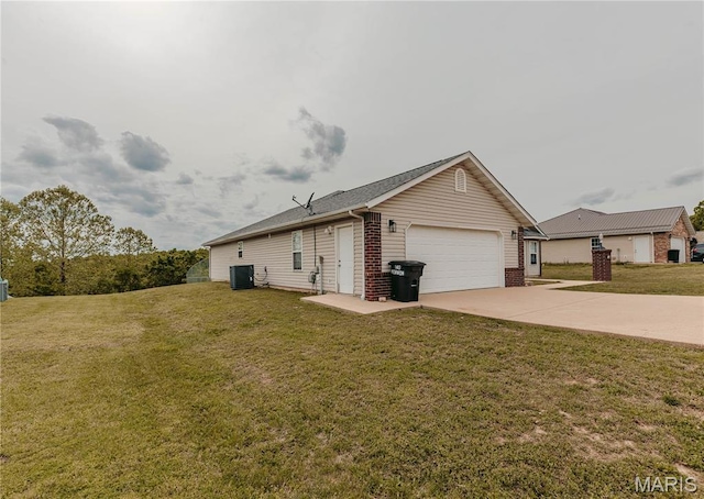 140 Vernon St, Saint Robert, MO 65584 - view of property exterior featuring concrete driveway, an attached garage, a yard, brick siding, and cooling unit
