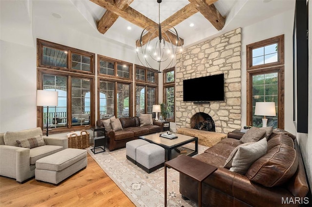 544 Quail Ridge Ln, Saint Albans, MO 63073 - living room with light wood-style floors, beam ceiling, coffered ceiling, a chandelier, and a high ceiling