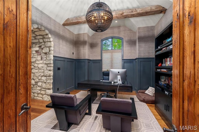 544 Quail Ridge Ln, Saint Albans, MO 63073 - office area with light wood-style floors, a wainscoted wall, a chandelier, a decorative wall, and beamed ceiling