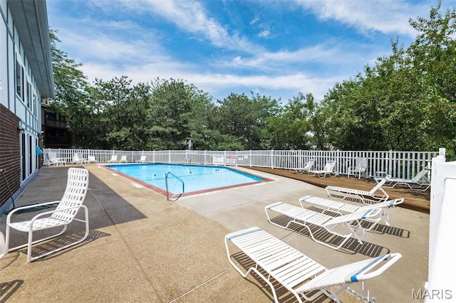 2317 Seven Pines Dr Unit 4, Saint Louis, MO 63146 - community pool featuring fence, a patio area, and view of scattered trees