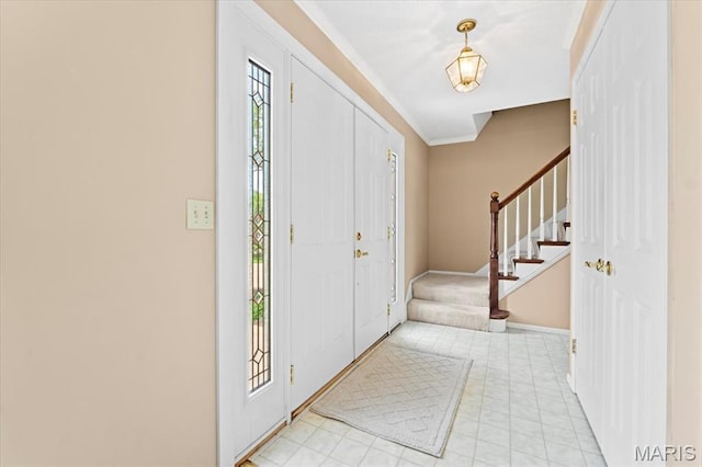 889 Almond Hill Ct, Manchester, MO 63021 - foyer entrance featuring stairway, ornamental molding, and baseboards