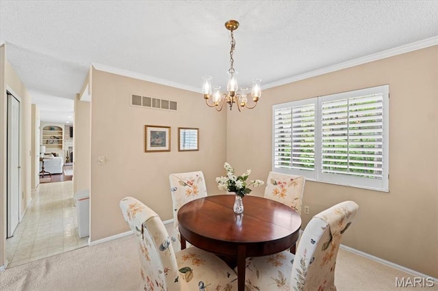 889 Almond Hill Ct, Manchester, MO 63021 - dining room with light colored carpet, a chandelier, ornamental molding, baseboards, and a textured ceiling