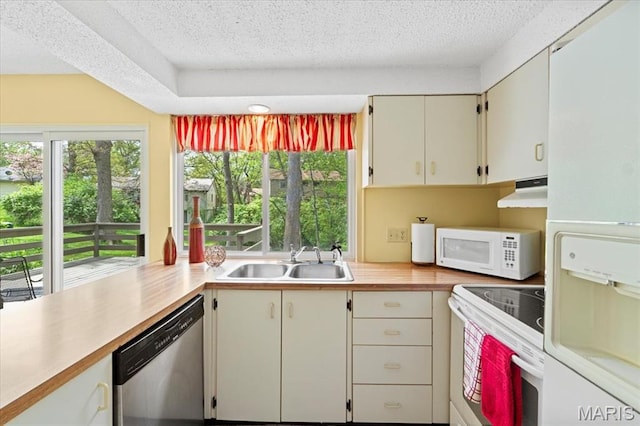 889 Almond Hill Ct, Manchester, MO 63021 - kitchen featuring white appliances, a sink, light countertops, a textured ceiling, and extractor fan