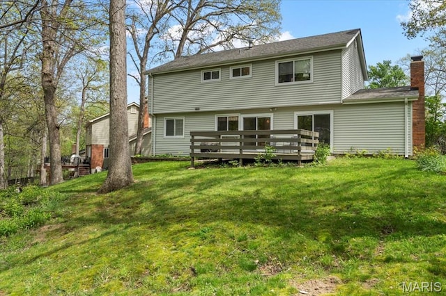 889 Almond Hill Ct, Manchester, MO 63021 - back of house with a deck, a lawn, and a chimney