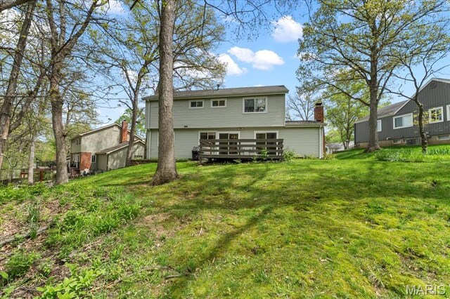 889 Almond Hill Ct, Manchester, MO 63021 - back of property with a yard, a deck, and a chimney
