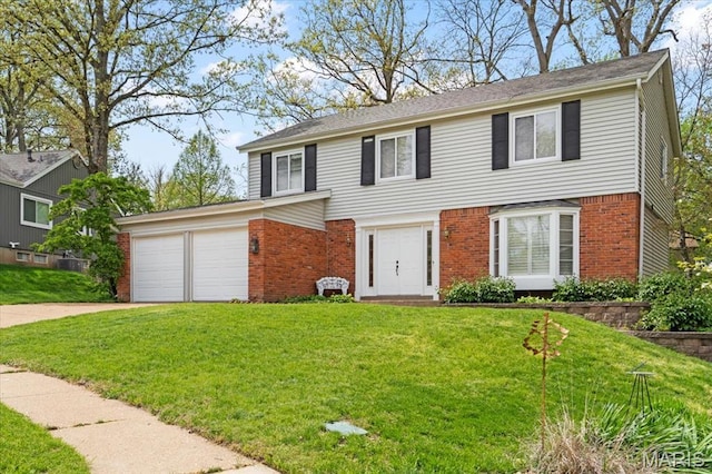 889 Almond Hill Ct, Manchester, MO 63021 - view of front of home featuring brick siding, concrete driveway, a garage, and a front lawn