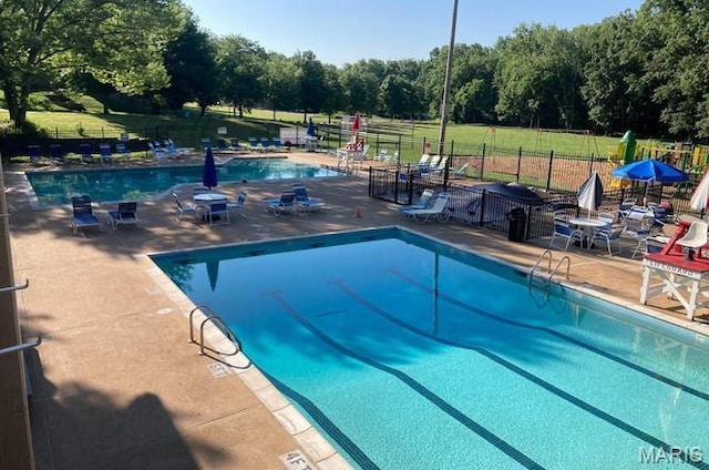 889 Almond Hill Ct, Manchester, MO 63021 - community pool with fence and a patio area