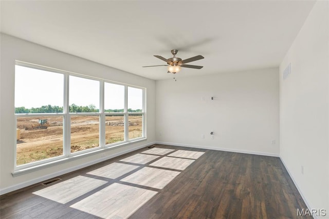 4145 Bear Ridge Dr, House Springs, MO 63051 - unfurnished room with wood finished floors, baseboards, and a ceiling fan