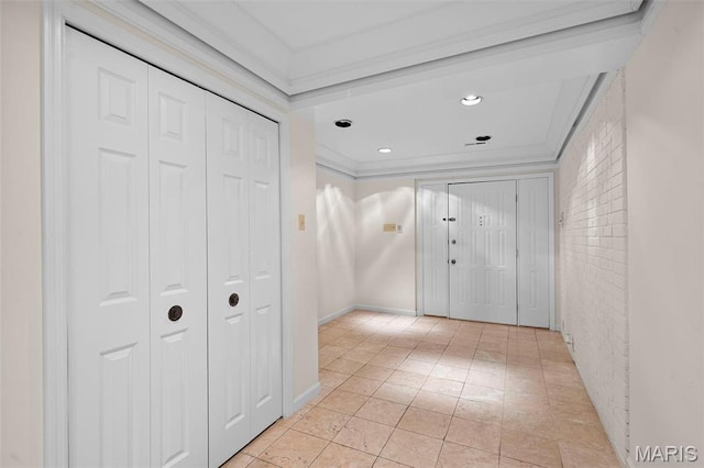 303 N Meramec Ave Unit 202, Saint Louis, MO 63105 - hall featuring ornamental molding, recessed lighting, and light tile patterned floors