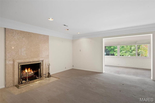 303 N Meramec Ave Unit 202, Saint Louis, MO 63105 - unfurnished living room featuring carpet, baseboards, ornamental molding, a fireplace, and recessed lighting