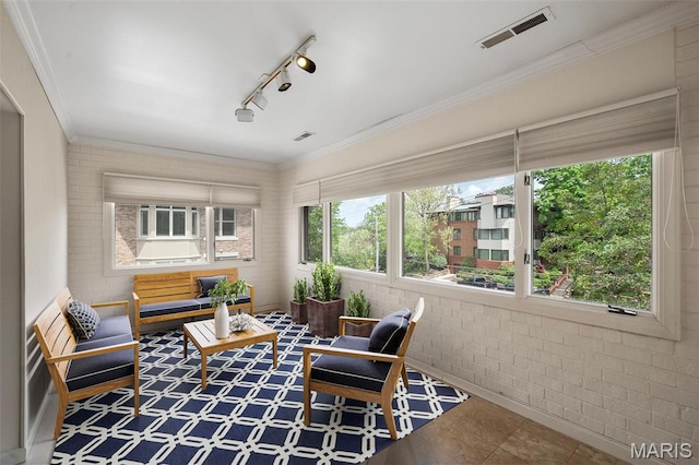 303 N Meramec Ave Unit 202, Saint Louis, MO 63105 - sunroom featuring track lighting