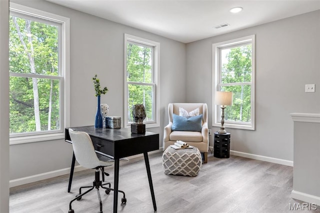 office with wood finished floors, baseboards, and recessed lighting
