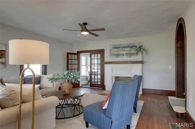 410 White St, Canton, MO 63435 - living room with a ceiling fan, healthy amount of natural light, baseboards, and a fireplace