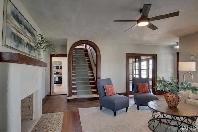 410 White St, Canton, MO 63435 - living area featuring stairway, wood finished floors, and ceiling fan