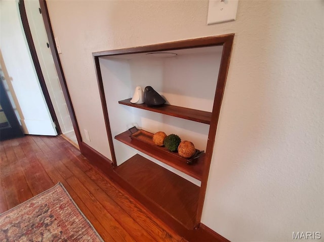 410 White St, Canton, MO 63435 - detailed view of wood finished floors and baseboards