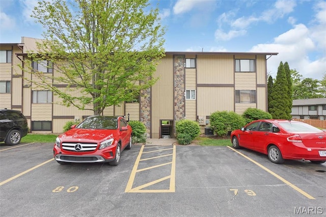 80 Lemans Ct Unit 80, Lake St Louis, MO 63367 - view of property featuring uncovered parking