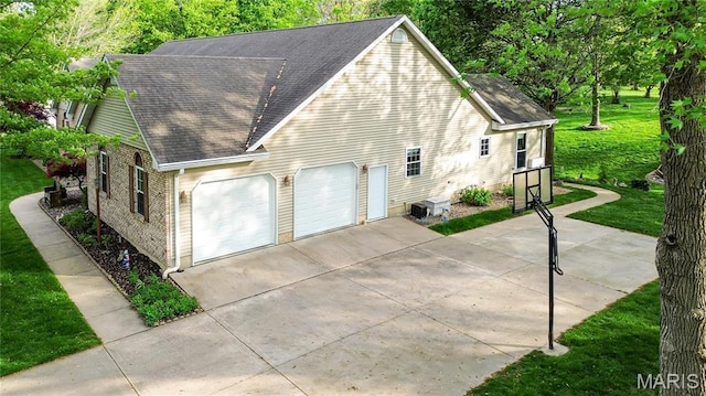 1302 Walnut St, Jerseyville, IL 62052 - view of side of home with a shingled roof and a lawn