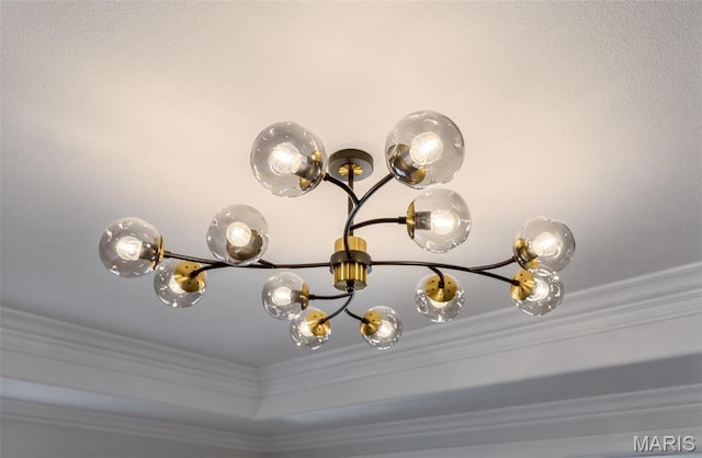709 Warren St, Farmington, MO 63640 - detailed view of crown molding and a chandelier