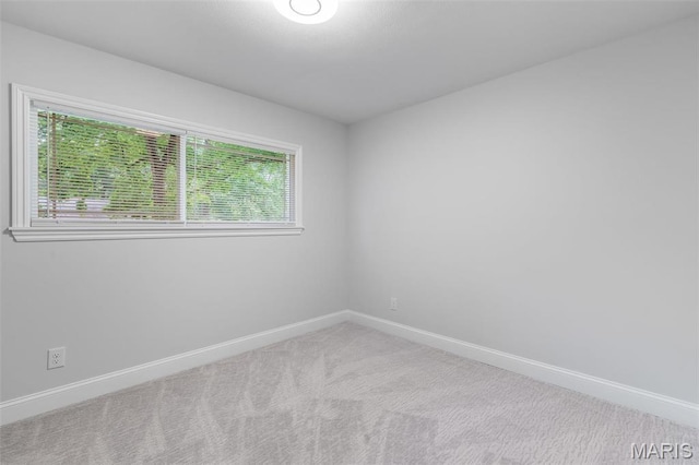 709 Warren St, Farmington, MO 63640 - carpeted spare room with baseboards