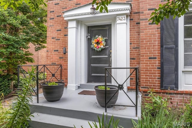 7423 Tulane Ave, Saint Louis, MO 63130 - doorway to property with brick siding