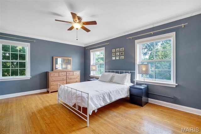 7423 Tulane Ave, Saint Louis, MO 63130 - bedroom featuring wood finished floors, ornamental molding, and a ceiling fan