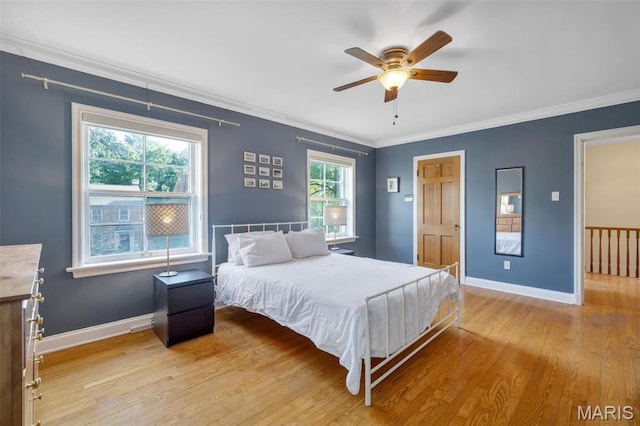 7423 Tulane Ave, Saint Louis, MO 63130 - bedroom featuring ornamental molding, wood finished floors, and a ceiling fan