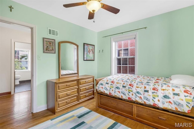 7423 Tulane Ave, Saint Louis, MO 63130 - bedroom with light wood-type flooring and ceiling fan