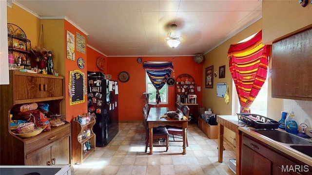8777 State Route 162, Troy, IL 62294 - dining space with crown molding, healthy amount of natural light, and light floors