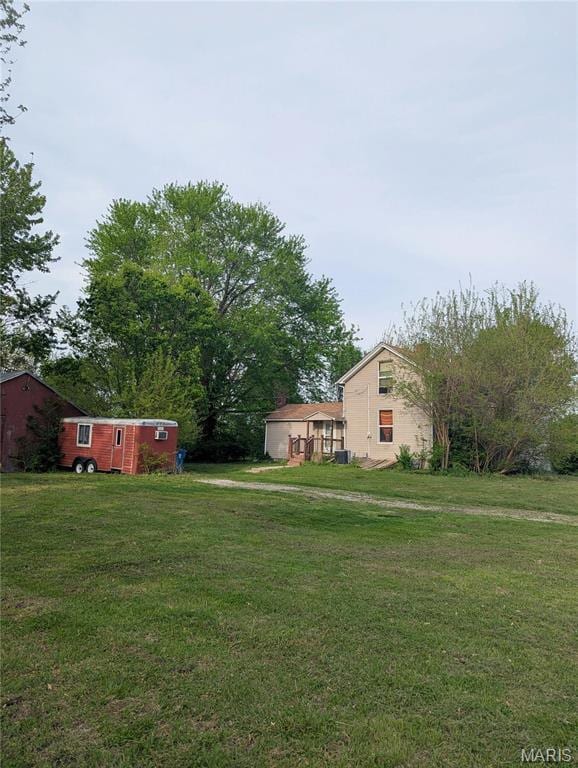 8777 State Route 162, Troy, IL 62294 - view of green lawn featuring cooling unit