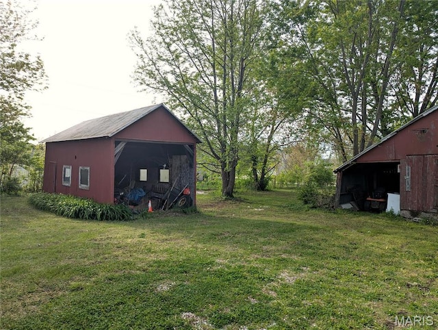 8777 State Route 162, Troy, IL 62294 - view of grassy yard featuring a pole building and an outdoor structure