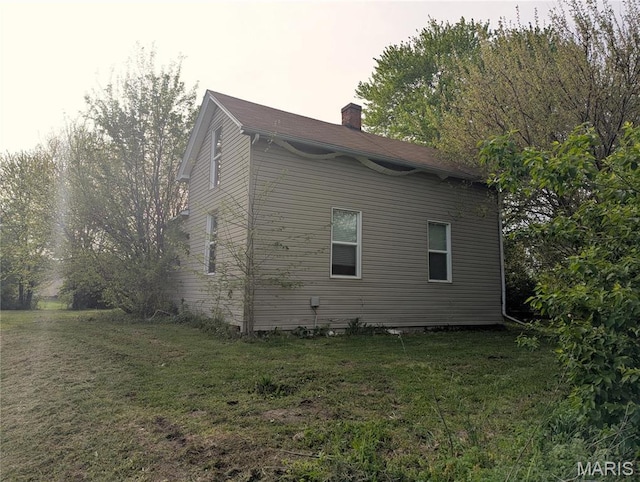 8777 State Route 162, Troy, IL 62294 - view of side of property with a chimney and a yard