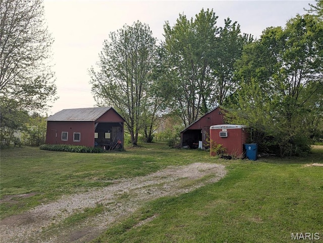 8777 State Route 162, Troy, IL 62294 - view of grassy yard with an outbuilding and a pole building