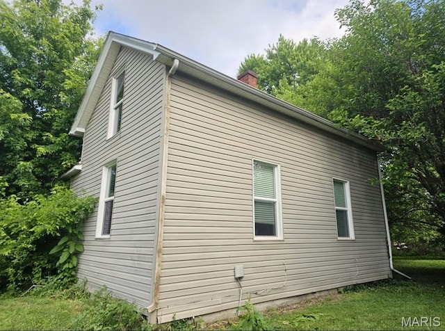 8777 State Route 162, Troy, IL 62294 - view of home's exterior featuring a chimney