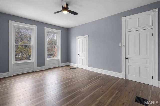 2148 Oregon Ave, Saint Louis, MO 63104 - spare room with ceiling fan, baseboards, and wood finished floors
