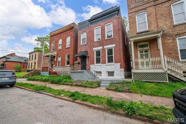 2148 Oregon Ave, Saint Louis, MO 63104 - view of property featuring brick siding